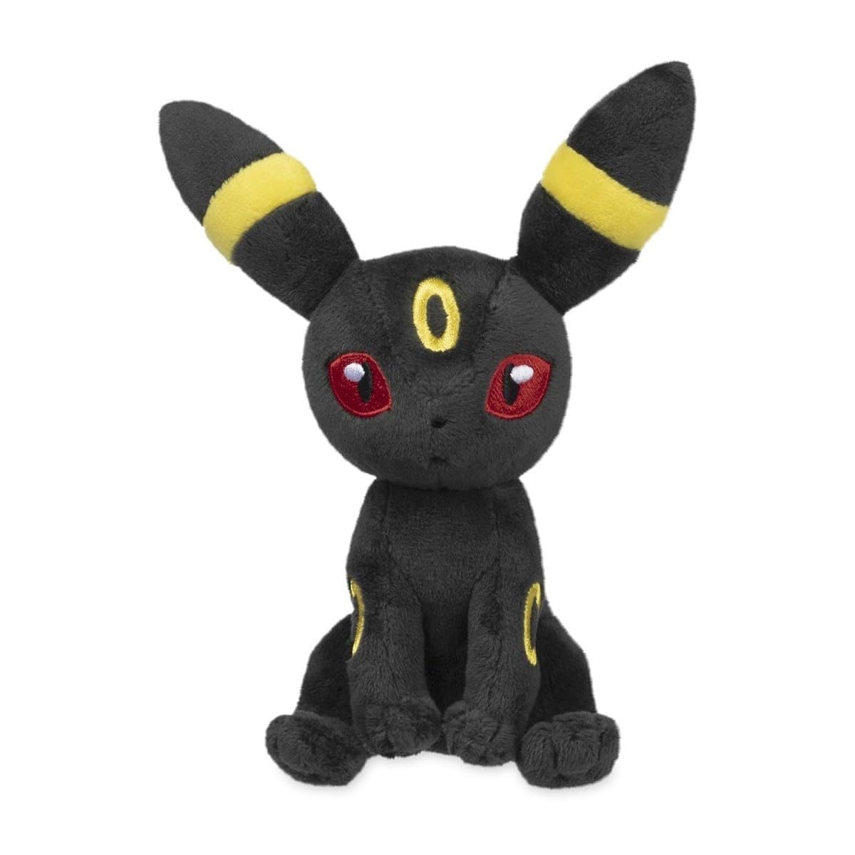 Pokemon Center Umbreon Sitting Cuties plush perched on desk for easy access.
