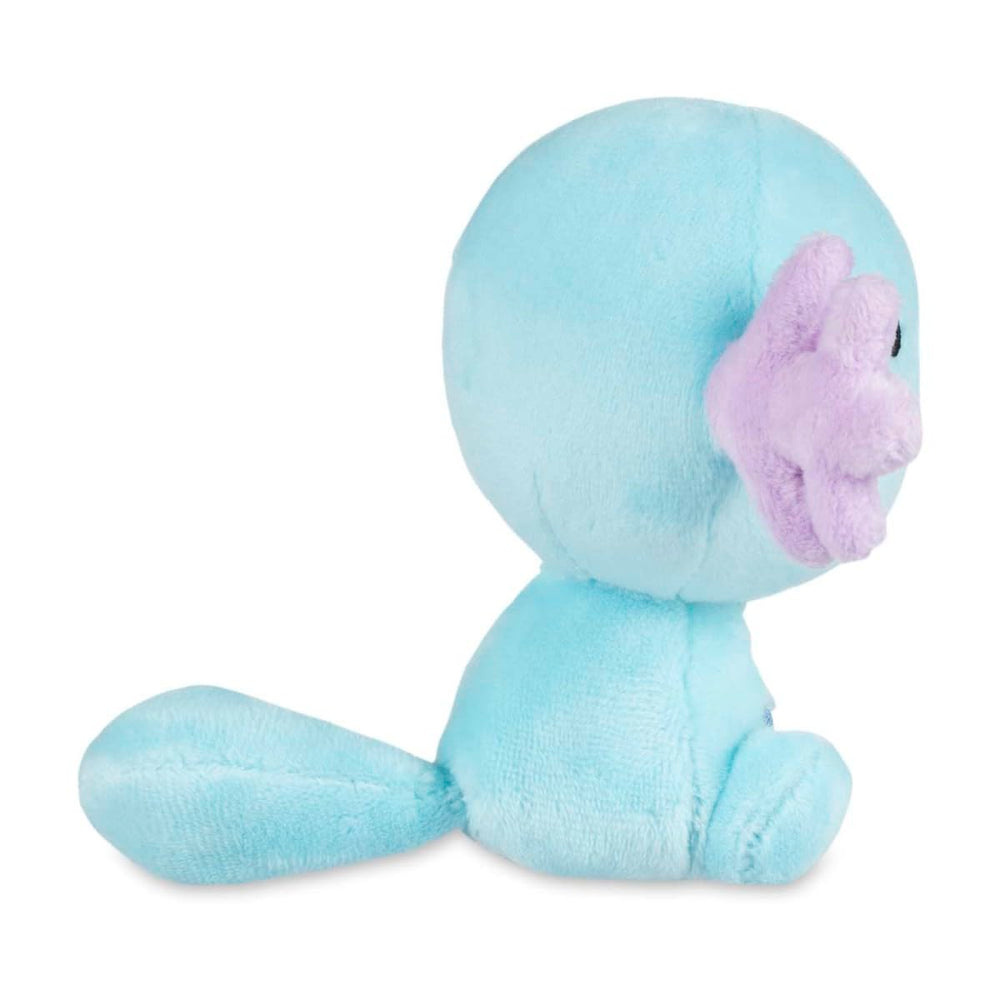 Pokémon Center Wooper Sitting Cuties Plush displayed on a desk in a cozy workspace