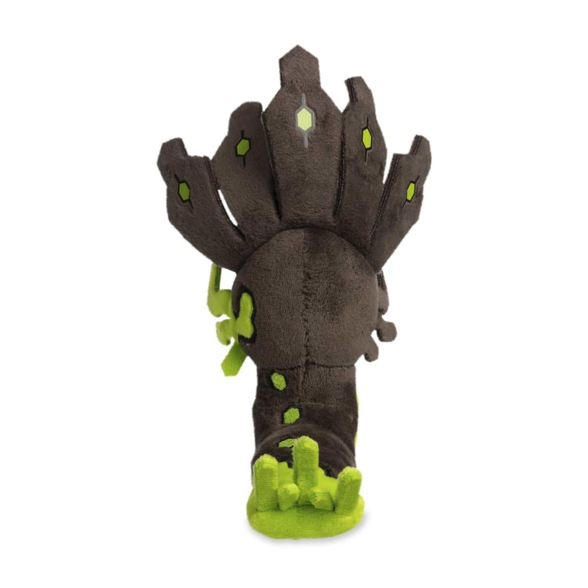 Zygarde Sitting Cuties Plush on a desk adds playful Pokémon charm