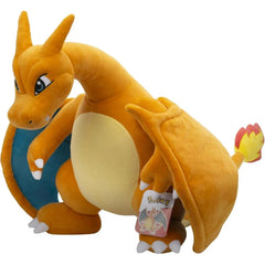 Pokemon Charizard plush texture close-up shows soft polyester fabric.