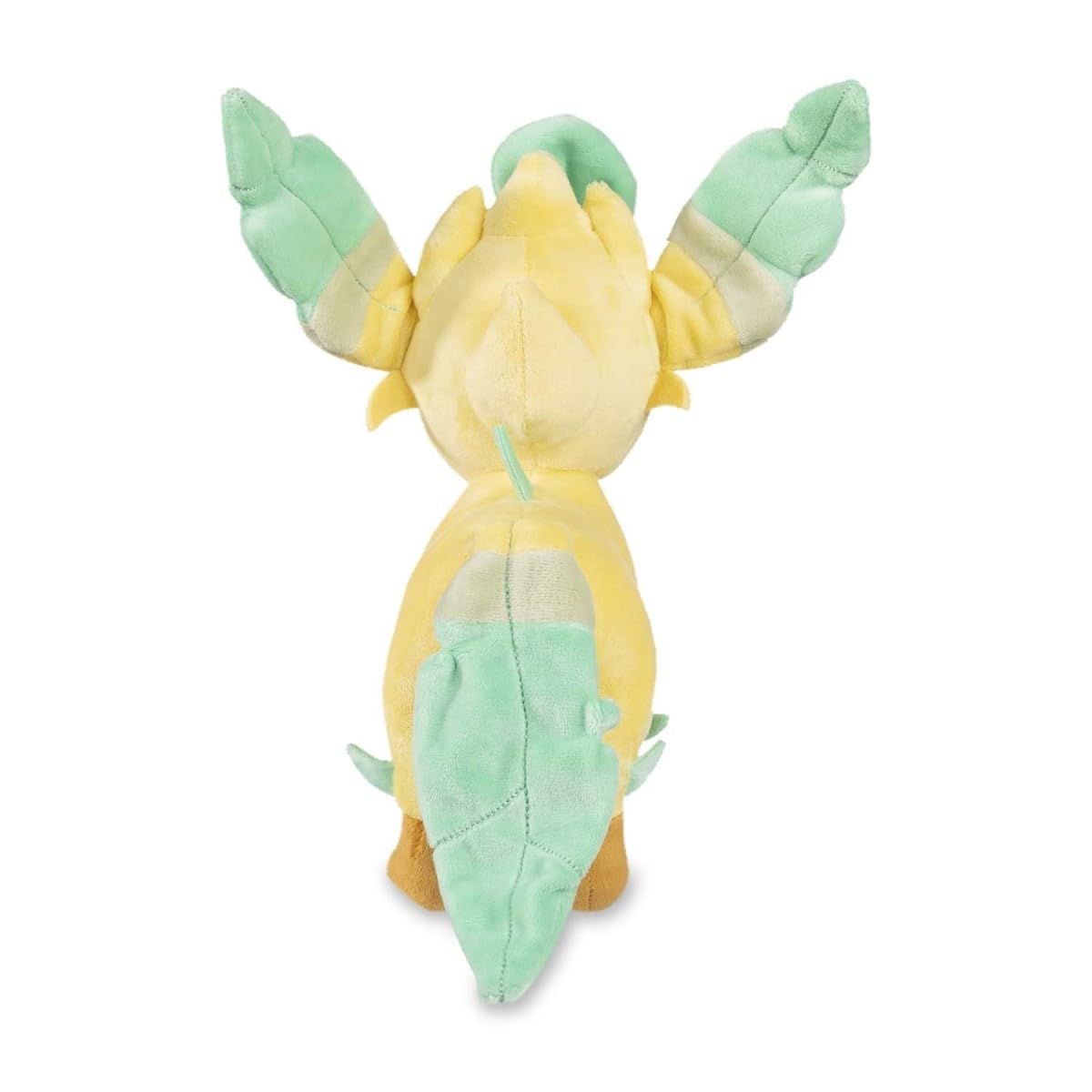 9.5-inch Leafeon plush beside plants for nature-inspired display.