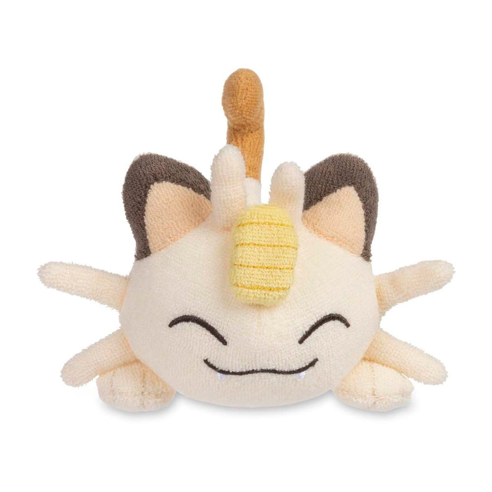 Pokemon Center Meowth Comfy Cuddlers plush side view highlights compact size for travel.