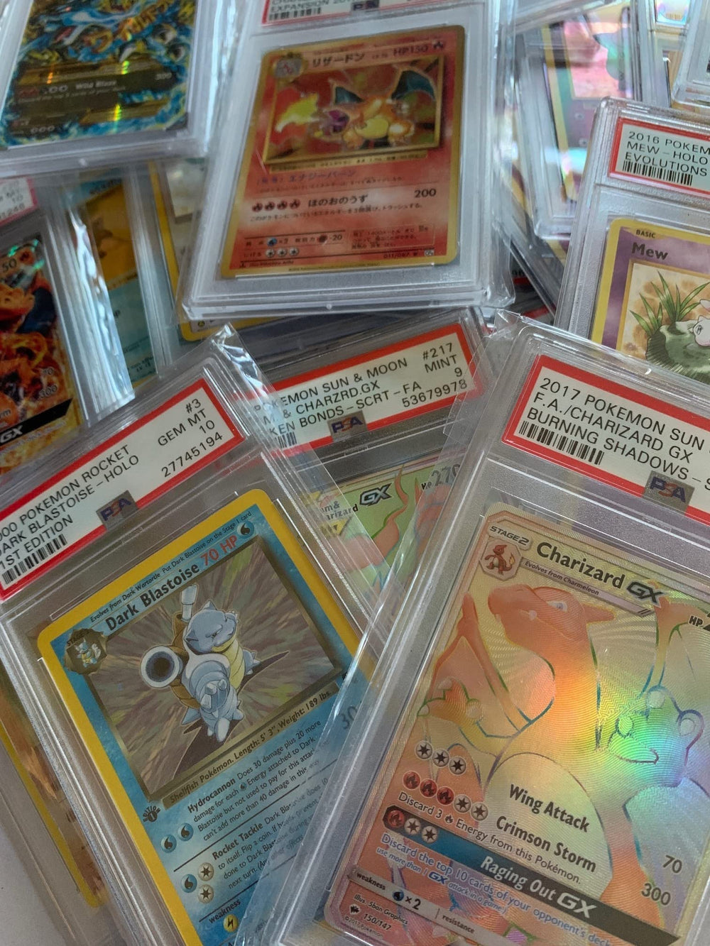 Pokémon PSA-graded card encased for display on a stand, perfect for collectors.