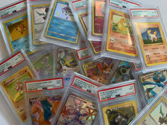 Random PSA Pokémon card in a clear case, ready for display collection.