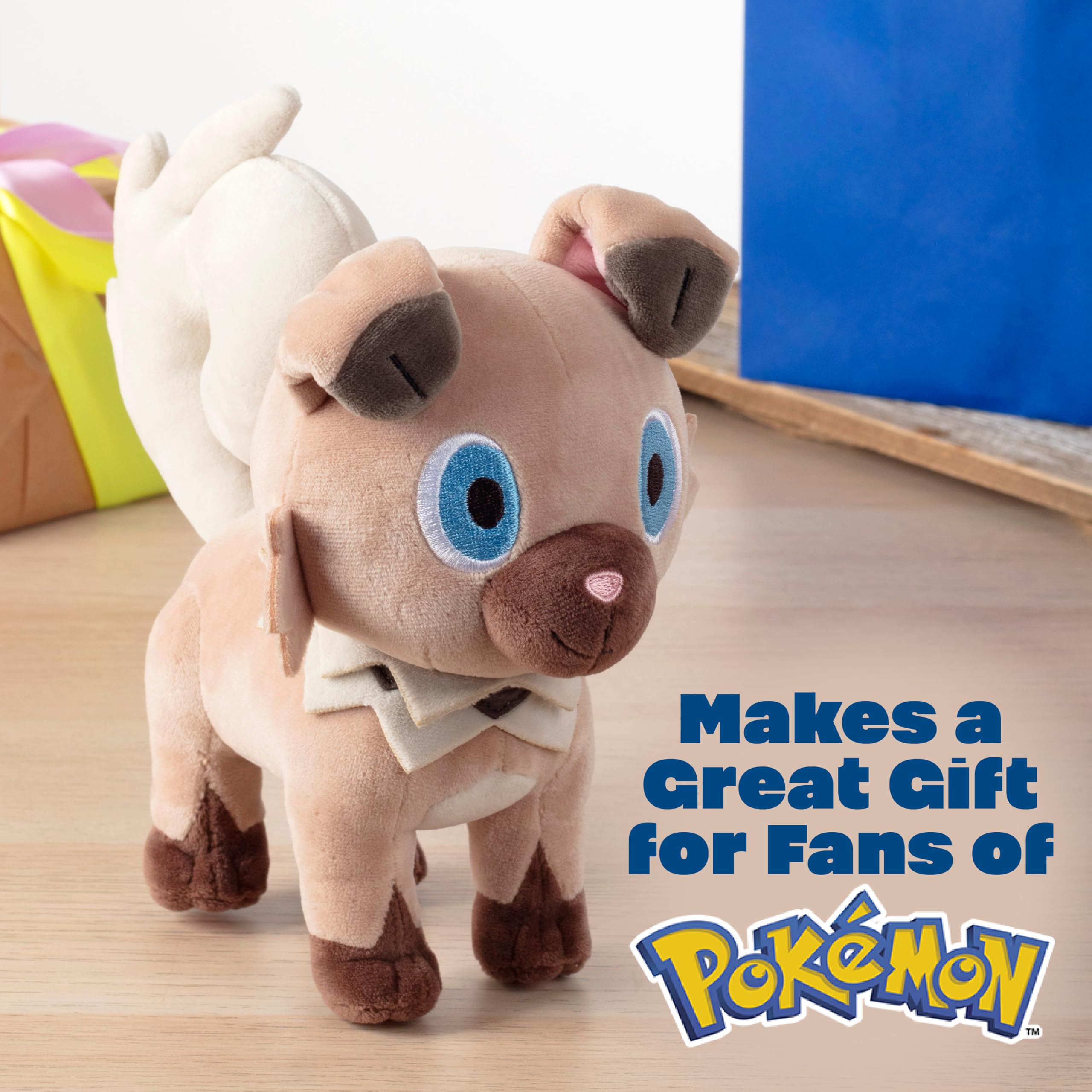 Pokémon Rockruff plush 8-inch back view, compact and portable companion.