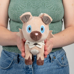 Pokémon Rockruff plush 8-inch in hand, ideal gift for Pokémon fans.