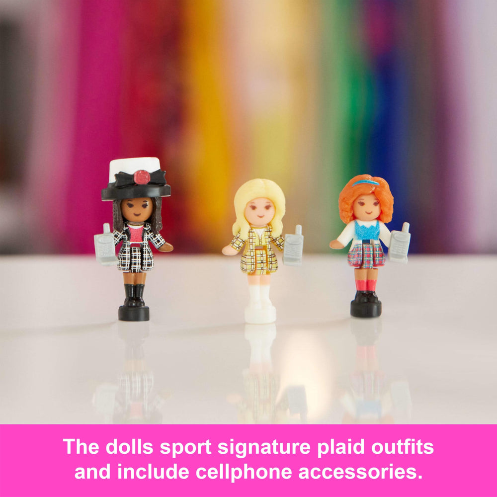 Polly Pocket Clueless Collector computerized closet, sliding door reveals plaid fashions.