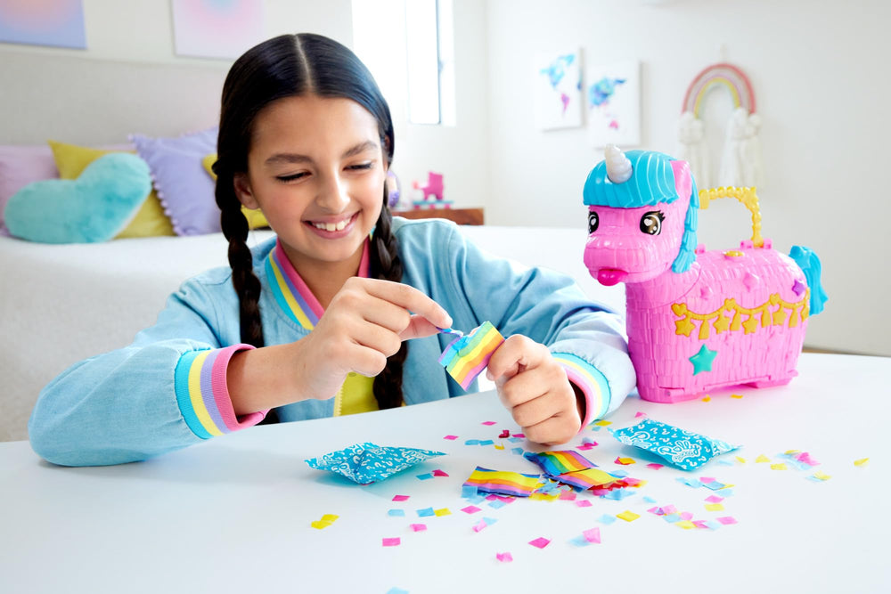 Polly Pocket dolls with party accessories encouraging cooperative, creative storytelling.