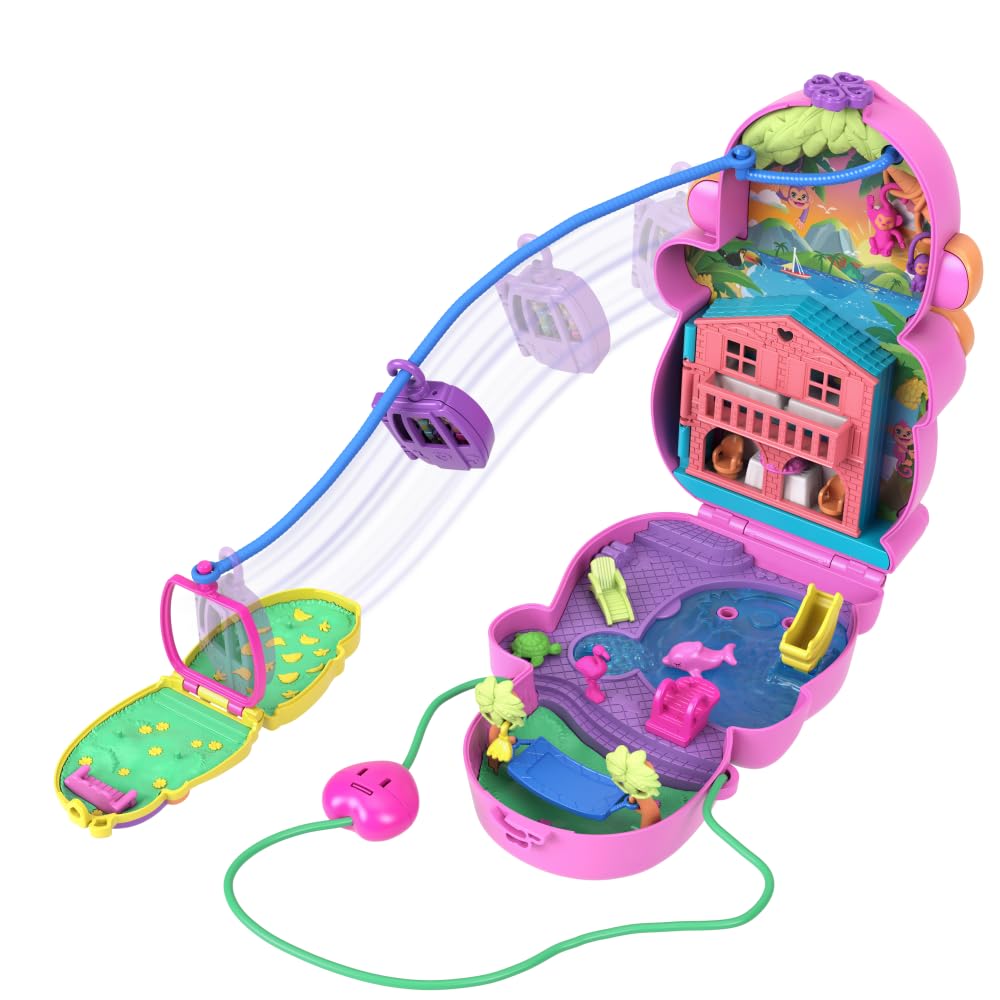 Polly Pocket two-floor house with daybed and dining table for cozy play.