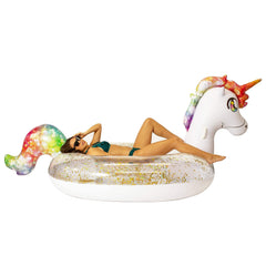 Kids enjoying the PoolCandy Gigantic Unicorn raft at a dorm pool party.