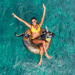 Poolcandy Inflatable 40in dragon pool ring for quick setup and storage.