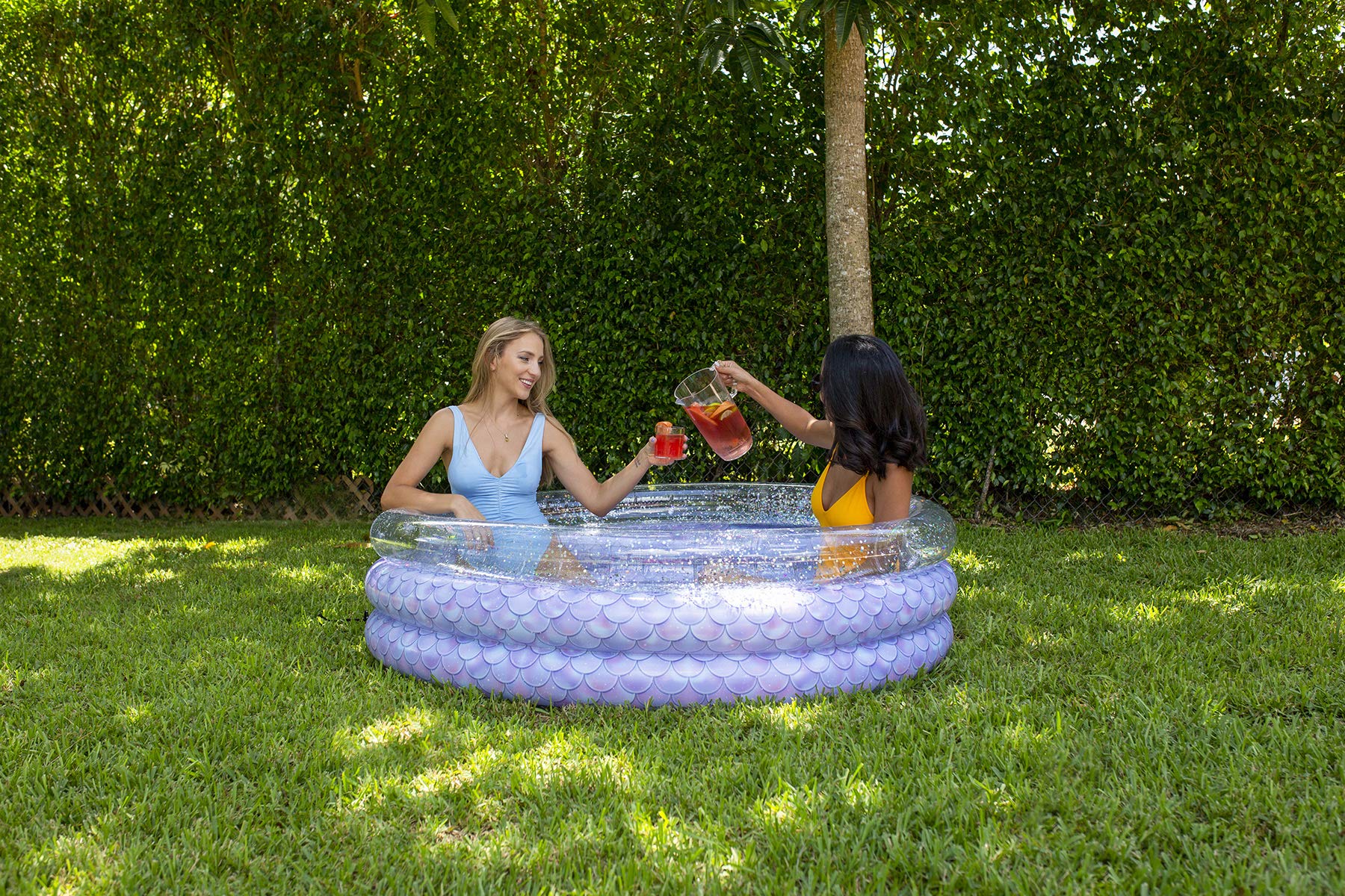PoolCandy Mermaid Print inflatable float with vibrant mermaid design for relaxing pool time.