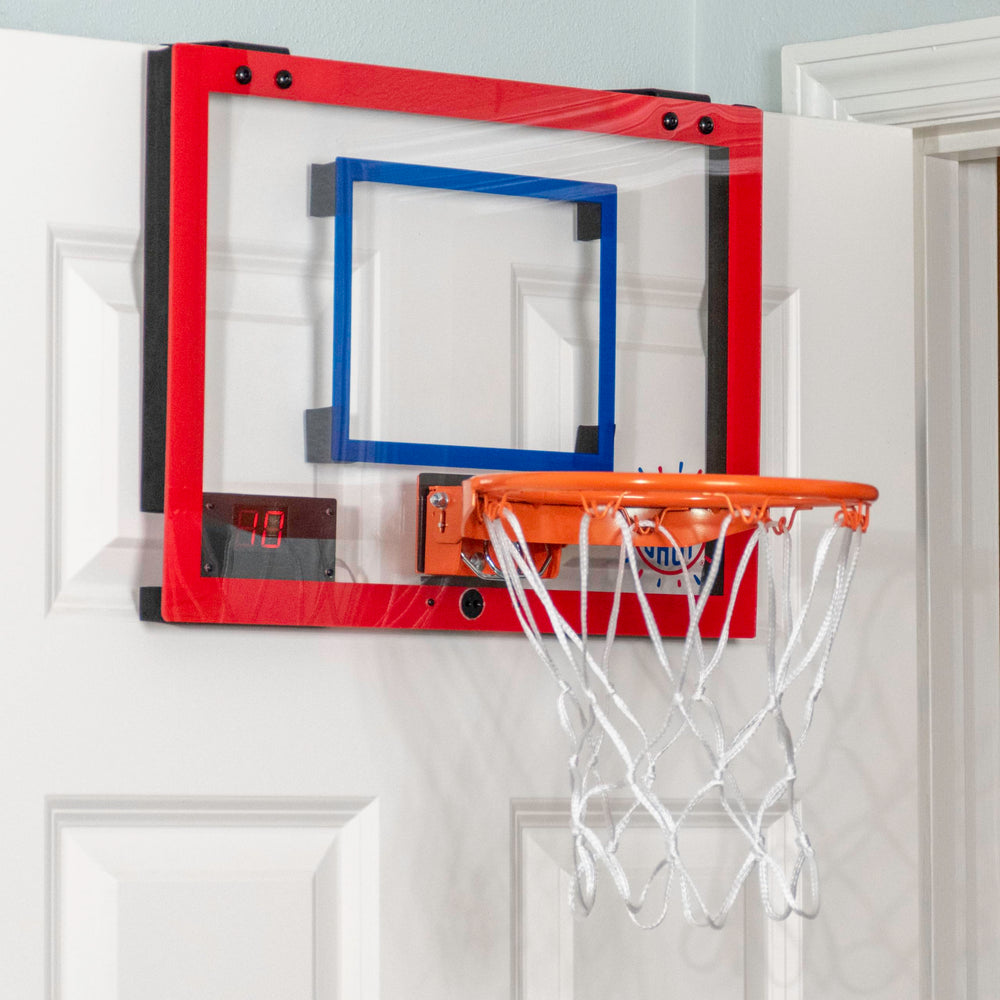 Pop-A-Shot Super Slam dunk action showcasing the durable rim in use.