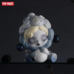 POP MART Skullpanda Ink Plum Blossom figure complements a themed collection.