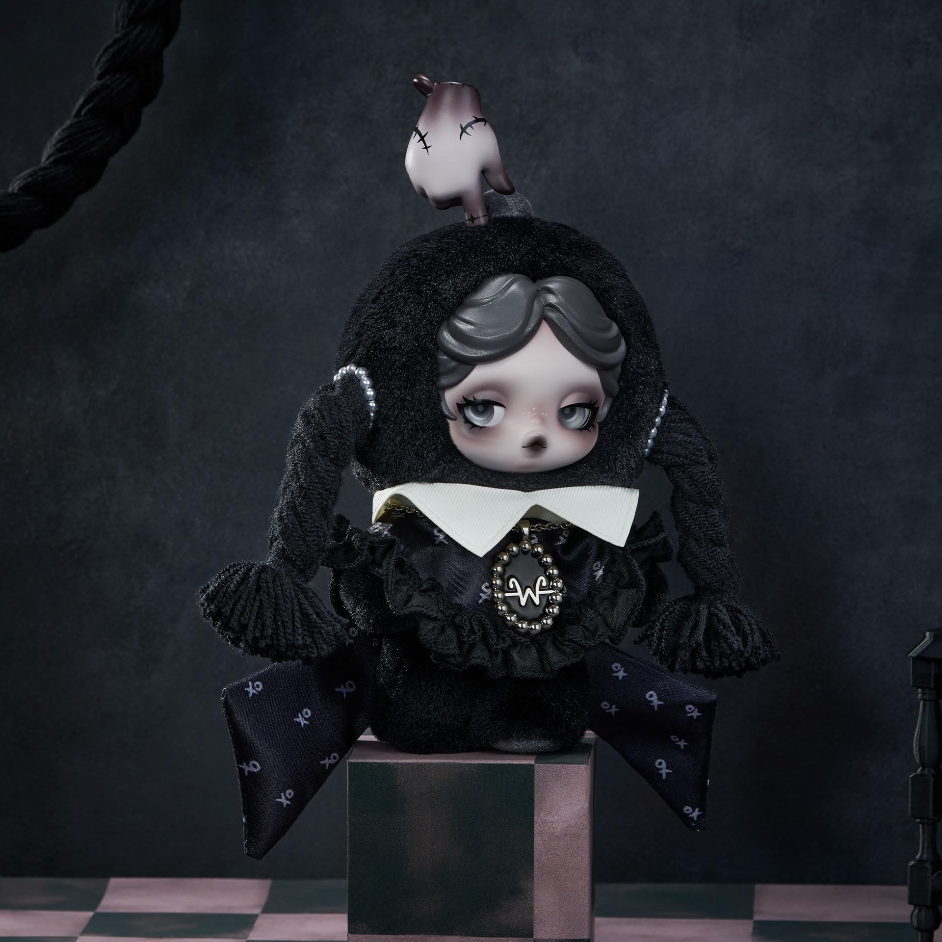 POP MART Skullpanda × Wednesday Plush side view, portable charm for bags and desks.