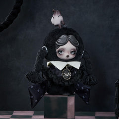 POP MART Skullpanda × Wednesday Plush side view, portable charm for bags and desks.