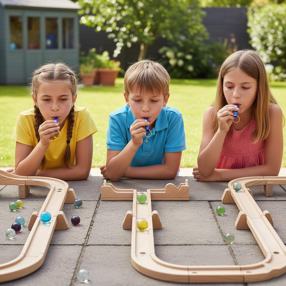 Poplay marbles on a race track setup for family play.