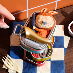 POP MART The Monsters collection display featuring varied designs on a shelf