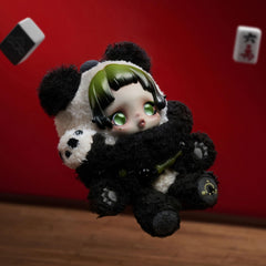 POP MART Skullpanda collectible toy shown on a display stand.