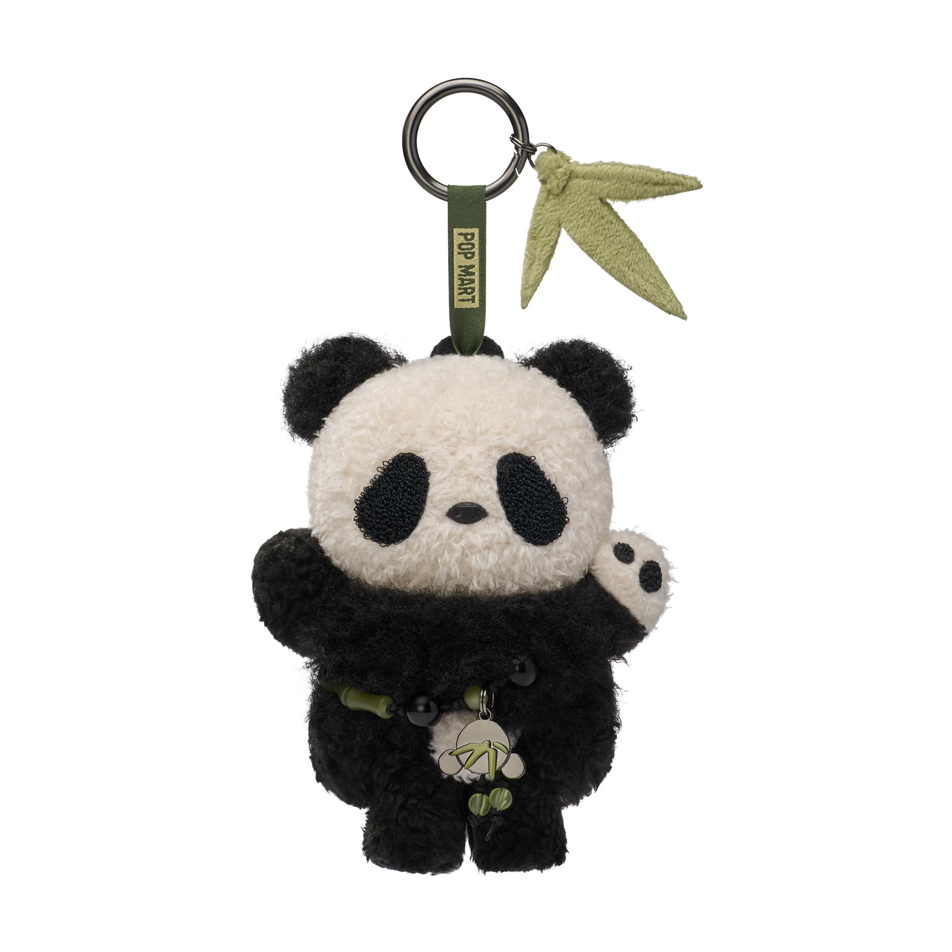 POP MART Skullpanda plush on a desk, showing a playful desk accessory.