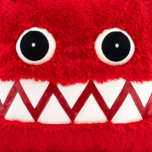 Close-up of Boxy Boo plush fabric showing vibrant colors and stitching