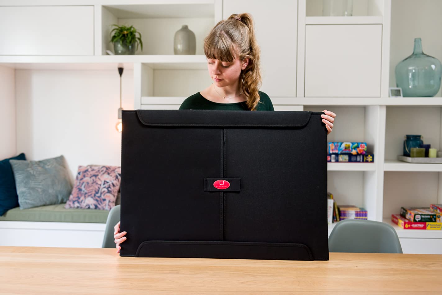 PortaPuzzle standard size surface fits puzzles up to 26-77 x 19-29 inches.