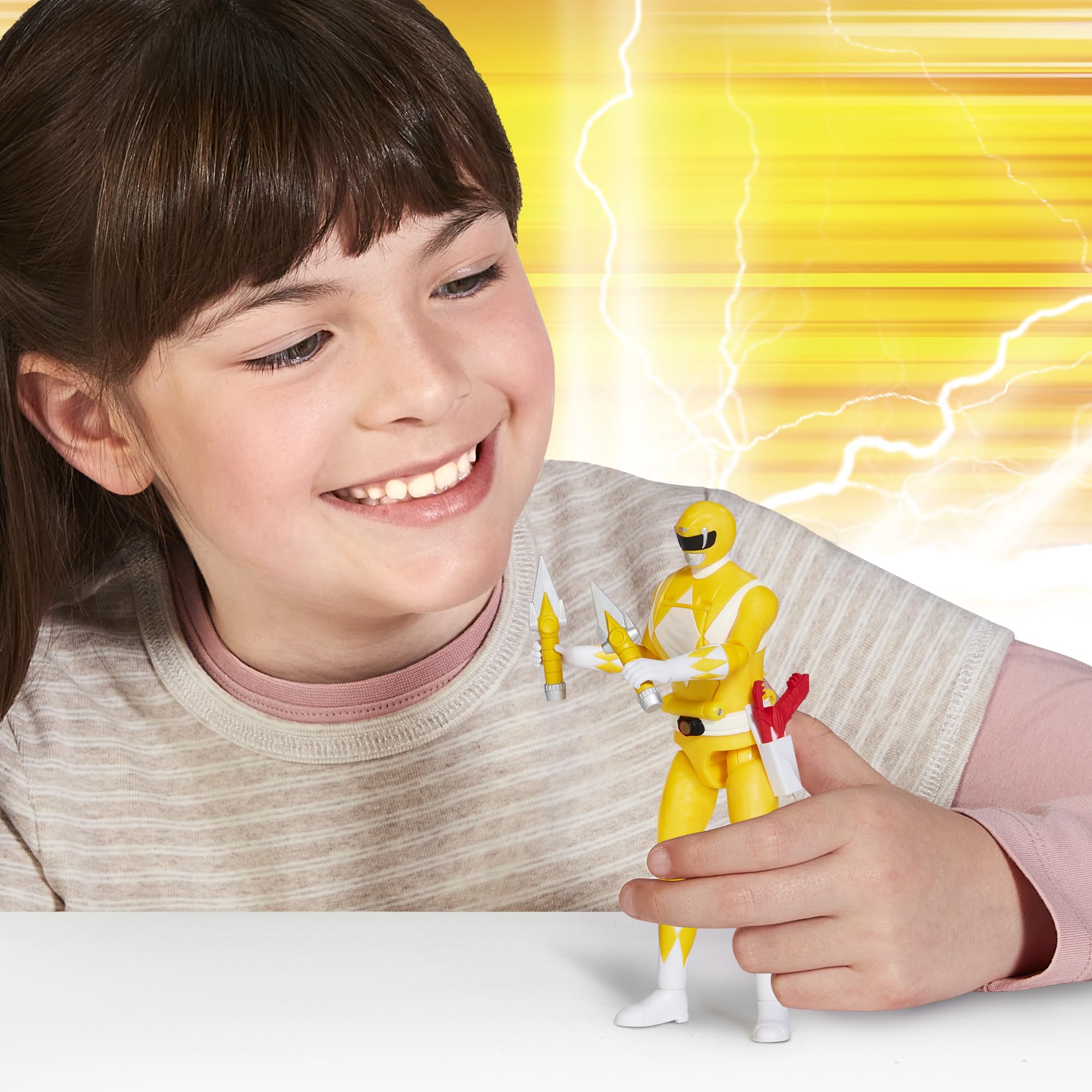 Close-up of Power Rangers Auto Morphin Yellow Ranger figure, detailed sculpt and vibrant colors for collectors.