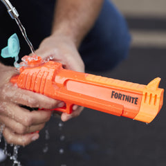 Powerful water burst drenches targets from a comfortable backyard range