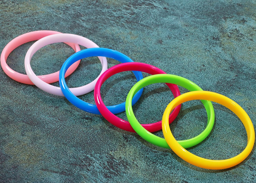 PPhtony neon resin cuffs close-up in multi-color for vibrant 80s fashion