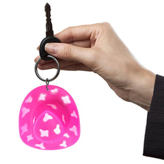 Colorful mini hats decorate toys and playsets for imaginative storytelling.