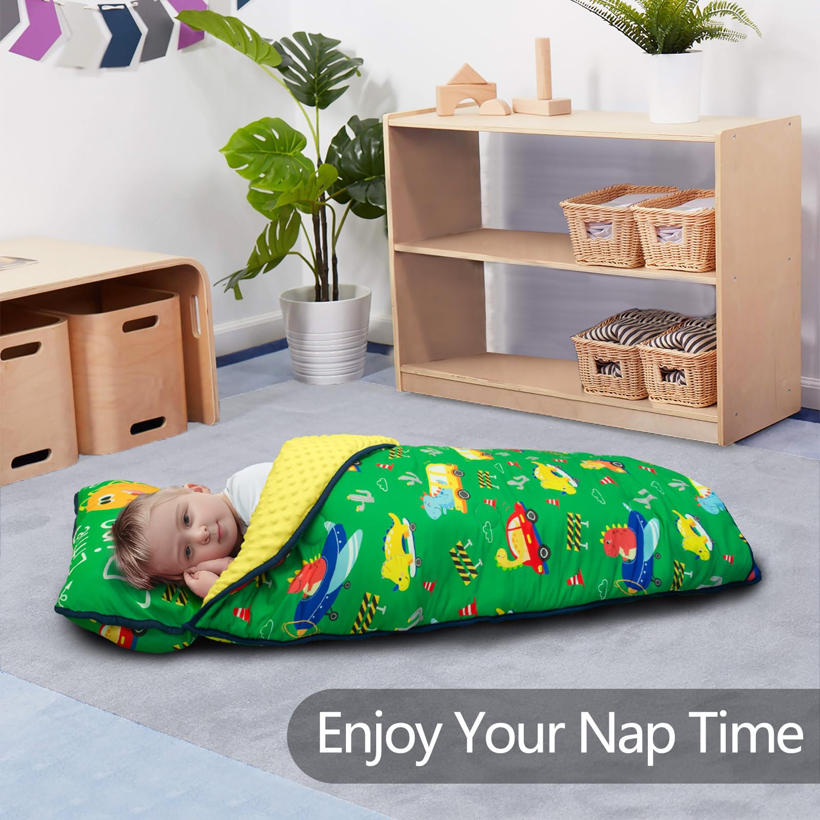 PRIMLECT nap mat rolled with sturdy handle for easy transport.