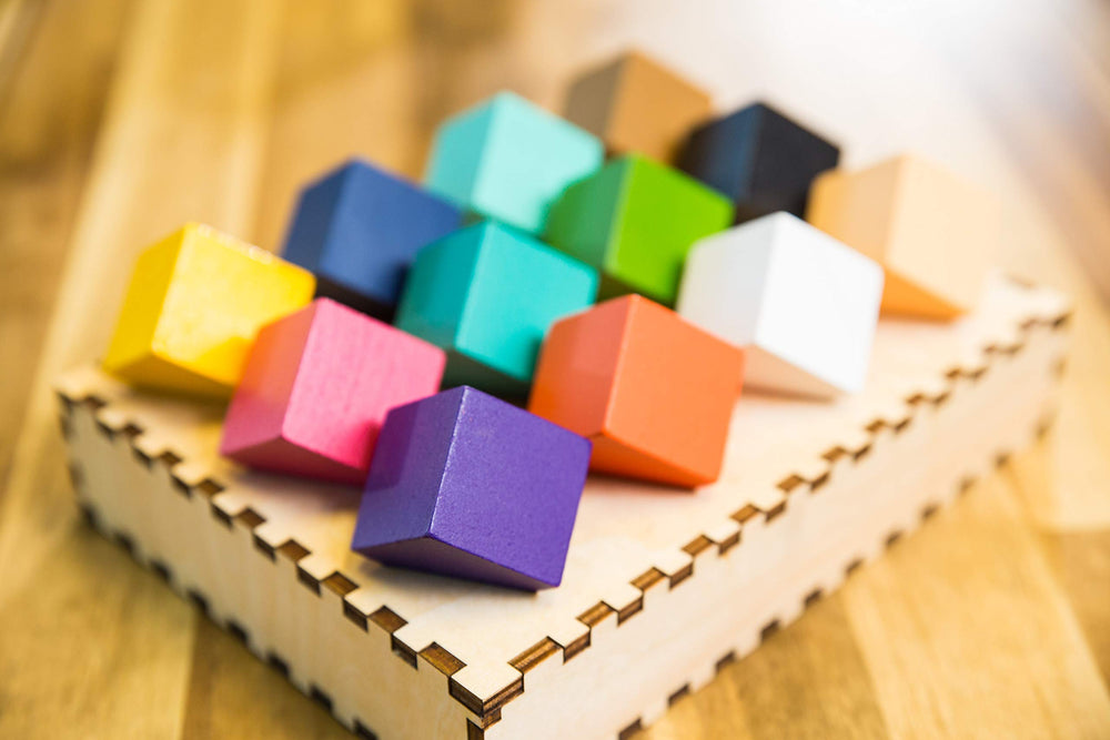 Project Genius Chroma Cube: laser-cut tray enabling precise stacking and tidy display.