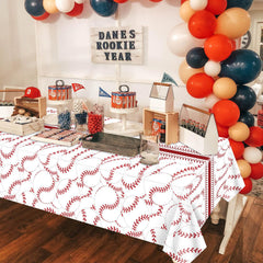 PTECDROTS baseball tablecloth doubles as a wall backdrop for photos.