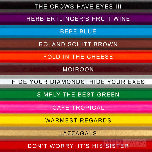 Pun Labs pencils with foil-stamped names shown in a closeup.