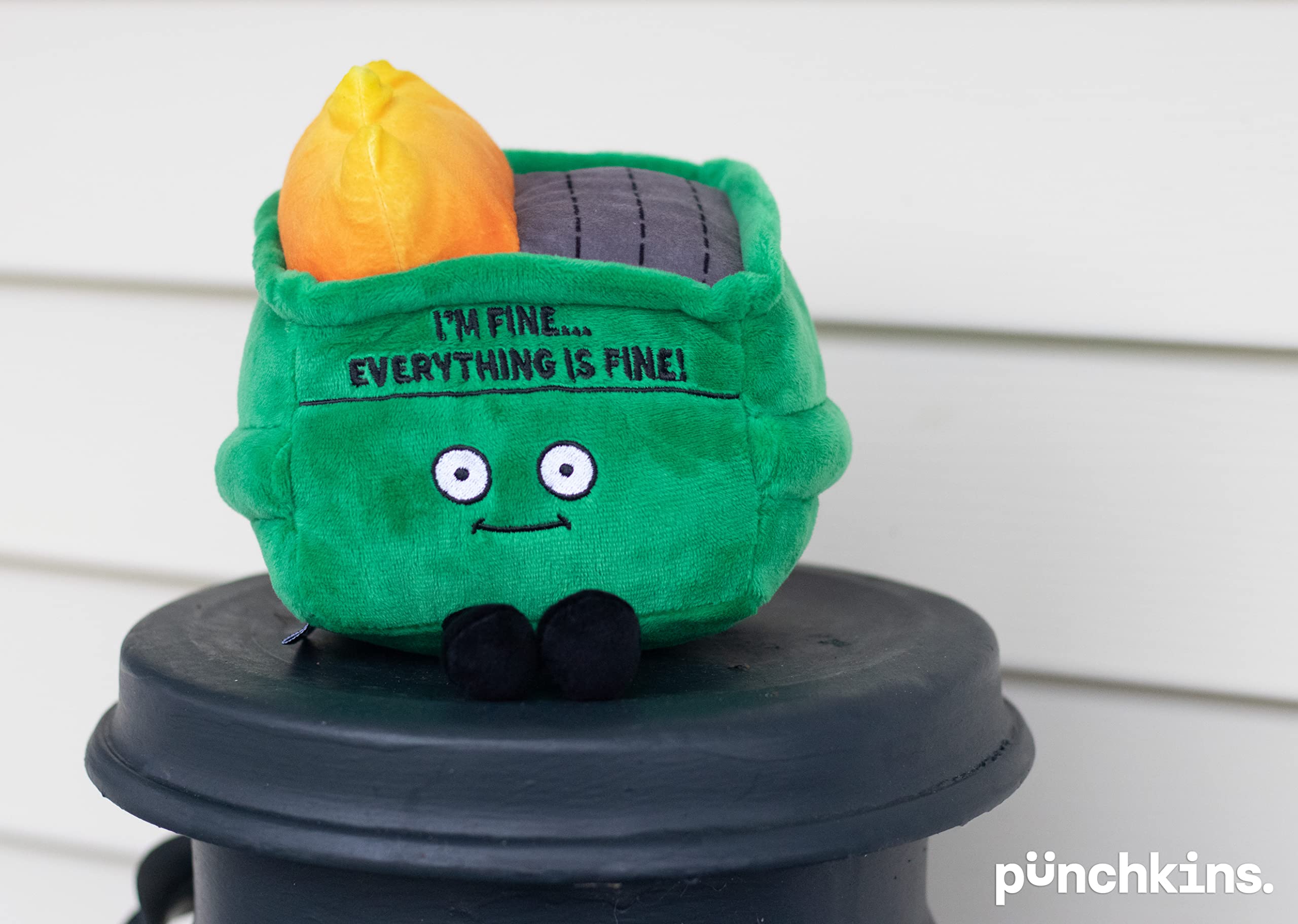 Punchkins Dumpster Fire Plushie side view shows the bead-filled base that helps it stand upright.