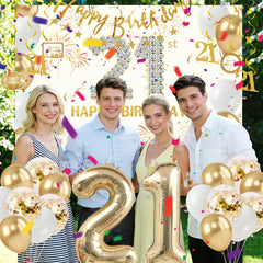 Purtarly hanging swirls in gold provide festive motion for backdrops