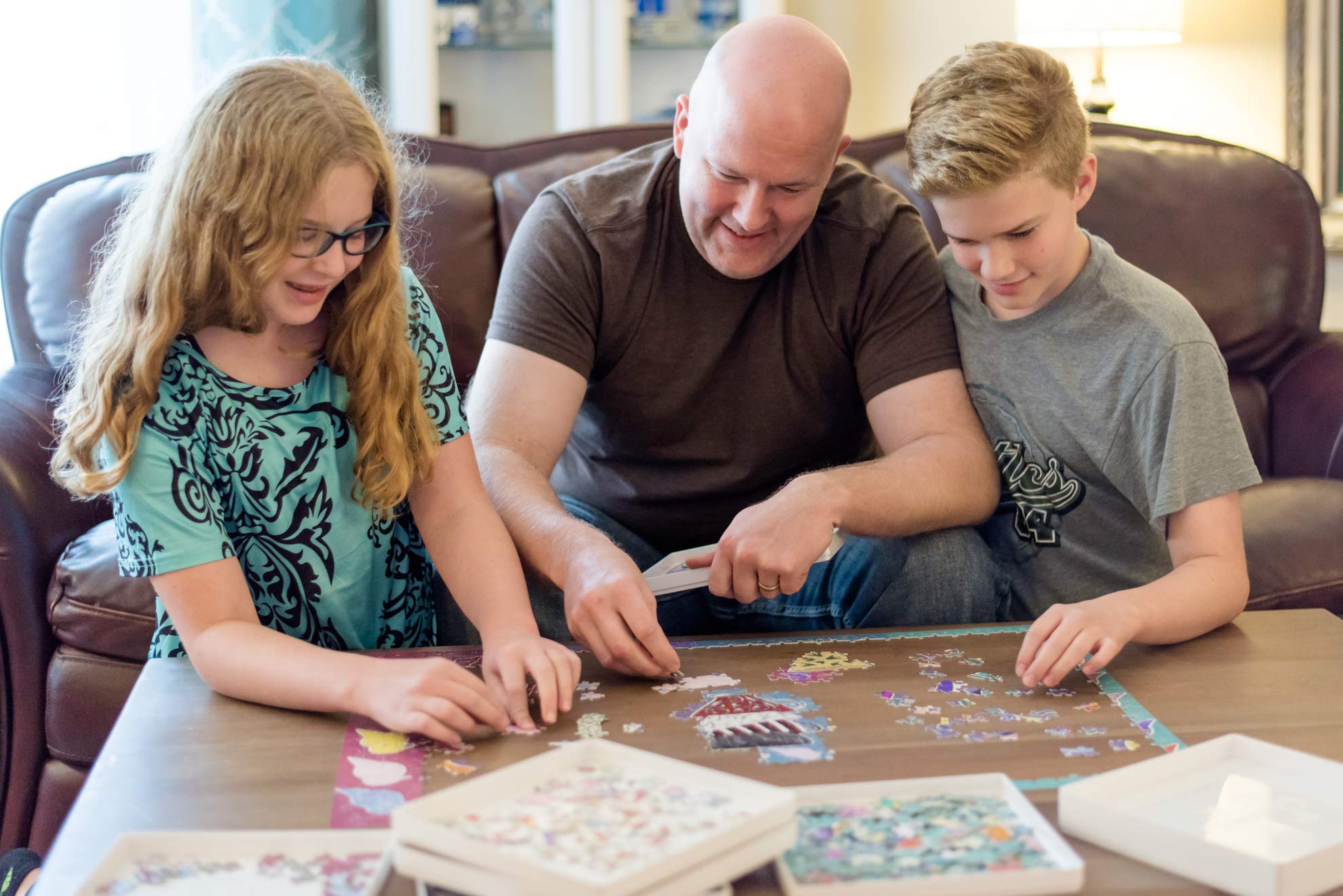 PUZZLE EZ space-saving design keeps puzzle pieces organized and accessible.