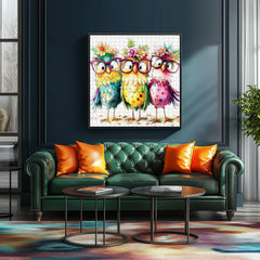 PuzzOne Colorful Owls puzzle packaging includes poster and replacement support.