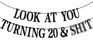 PYBHILK black glitter banner for turning 20 creates a festive focal point.