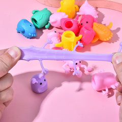 Qiuttnqn monster stretchy finger puppets in hand enabling imaginative role play and storytelling.