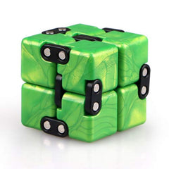 QiyI Little Golden Elephant infinity cube emerald green, closed view, aids focus on tasks.