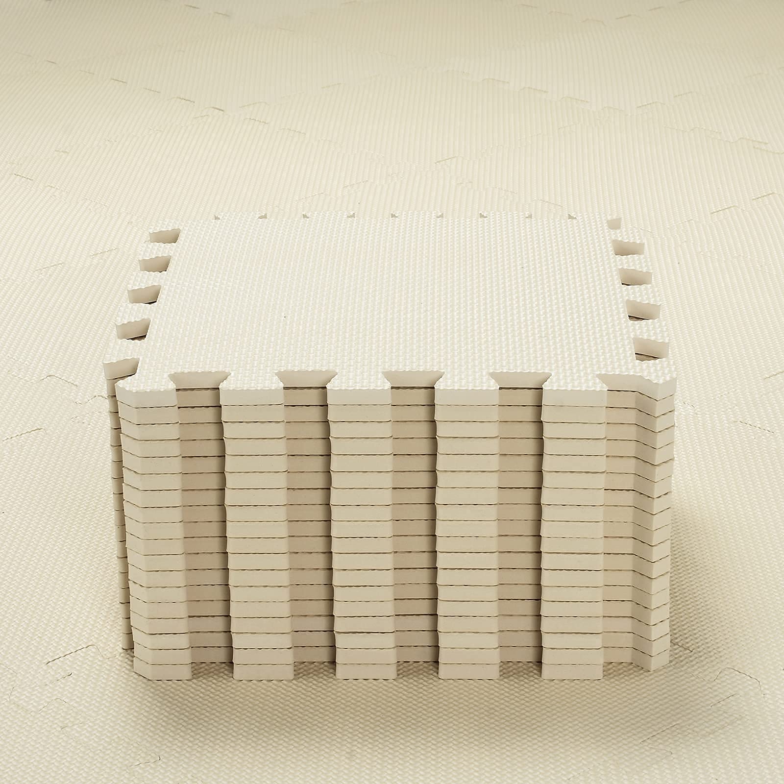 qqpp Baby play mat in beige offers a soft, non-toxic space for early learning