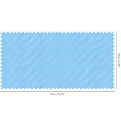 qqpp blue interlocking mats laid out as a baby play area in the living room