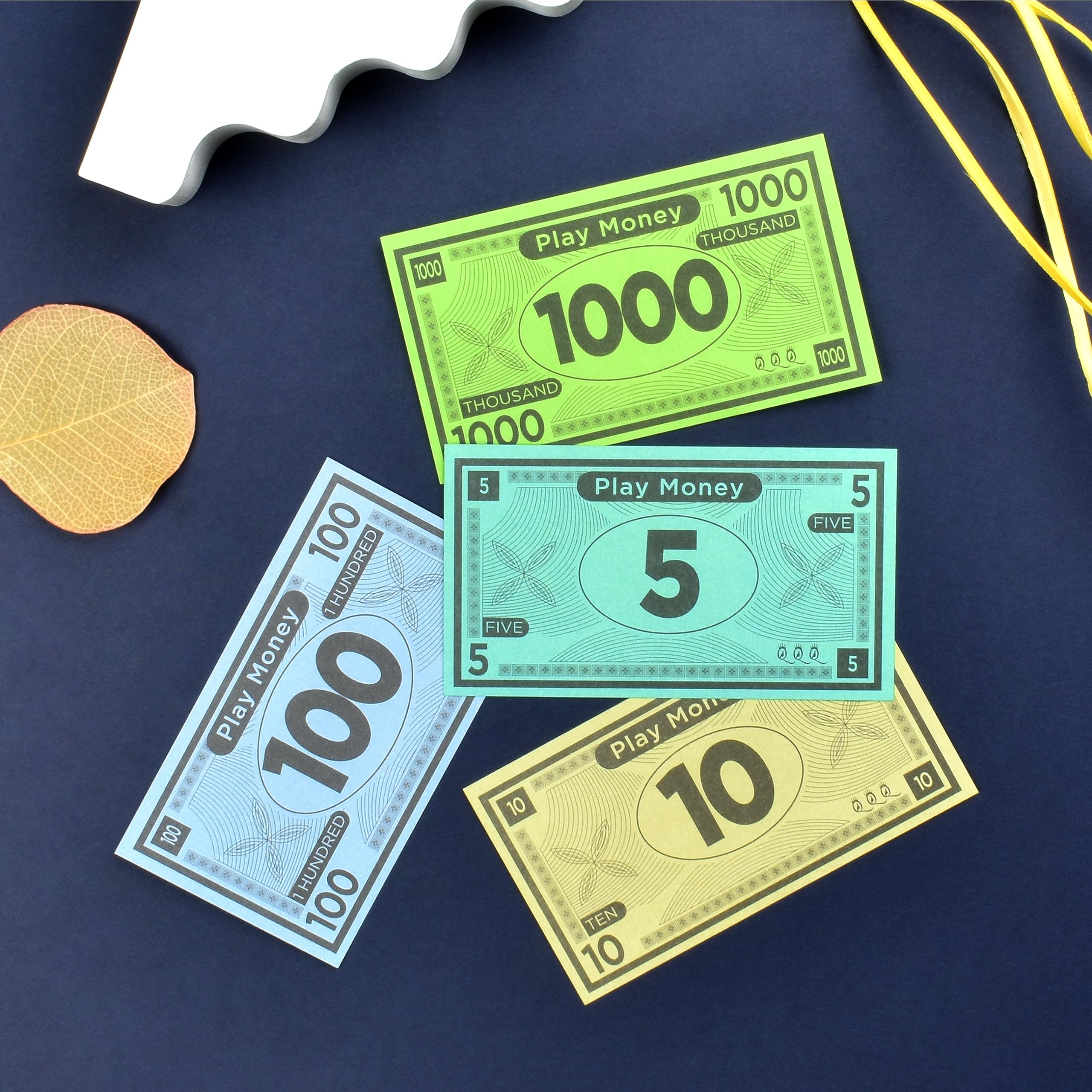 Queensell Play Money helps kids learn money and counting.