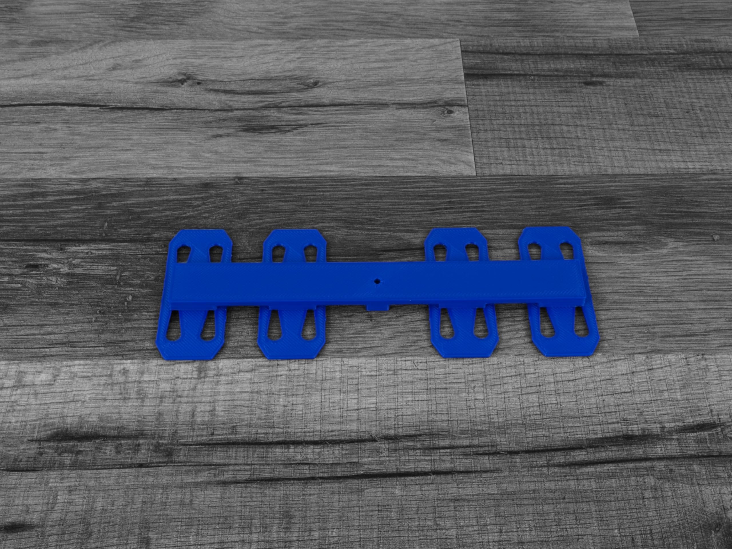 QuirkWorks 3D Track Spacers 6-lane arrangement for complex track layouts.