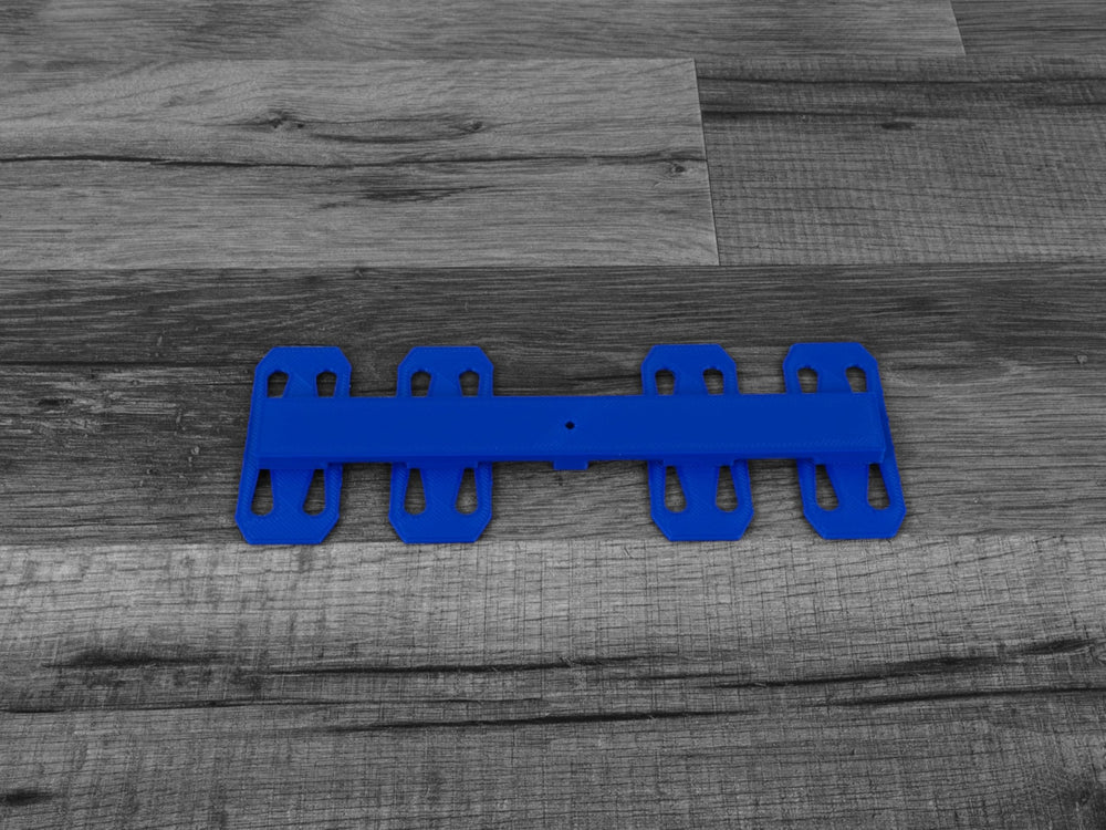 QuirkWorks 3D Track Spacers 6-lane arrangement for complex track layouts.