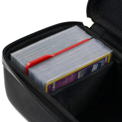 Corner pads and adjustable dividers keep cards secure during transport.