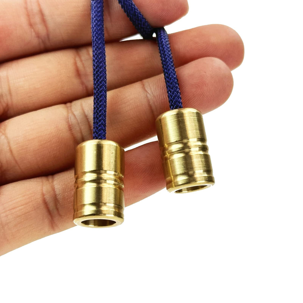 QULNEXA Begleri beads in metal box for organized, on-the-go storage.