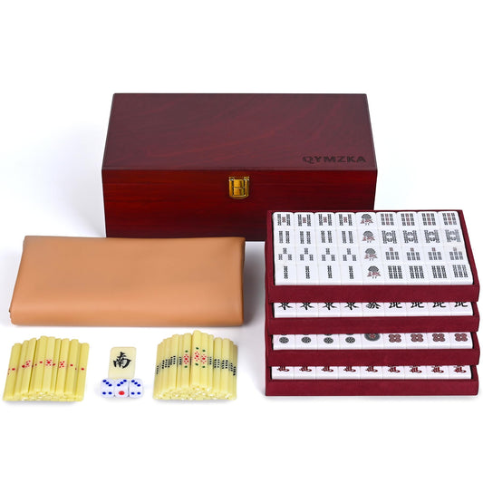 QYMZKA Riichi Mahjong tiles close-up with glossy golden-yellow backs for immersive play