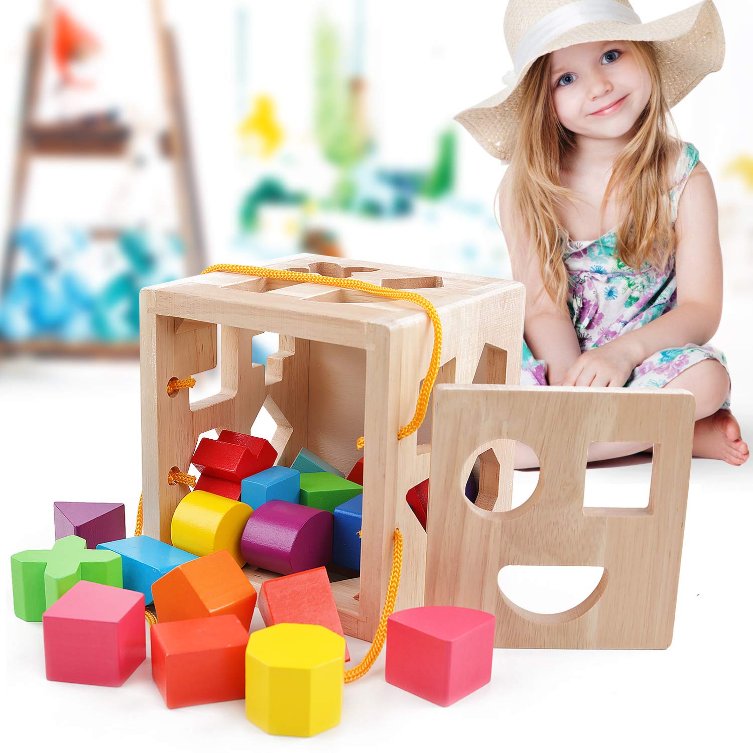 QZMTOY Toddler uses shape sorter for hands-on problem solving.